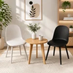 White and black minimalist shell dining chairs in a modern Scandinavian room